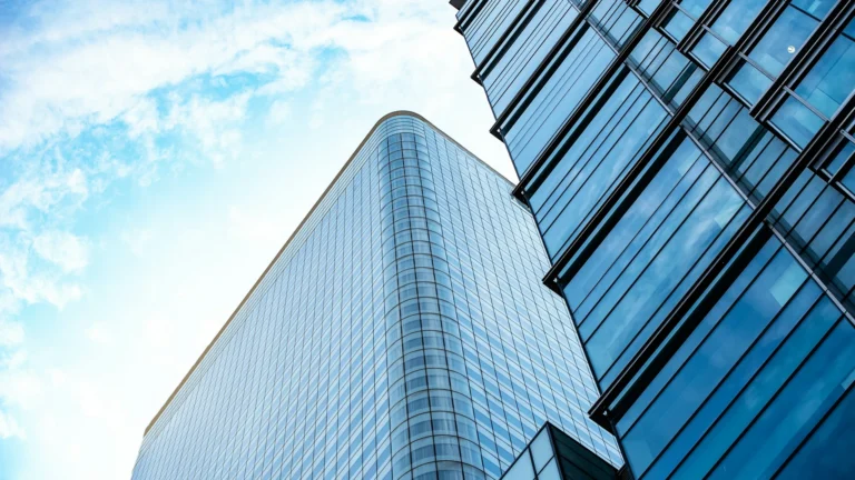 Side/skywards view of brand new office buildings